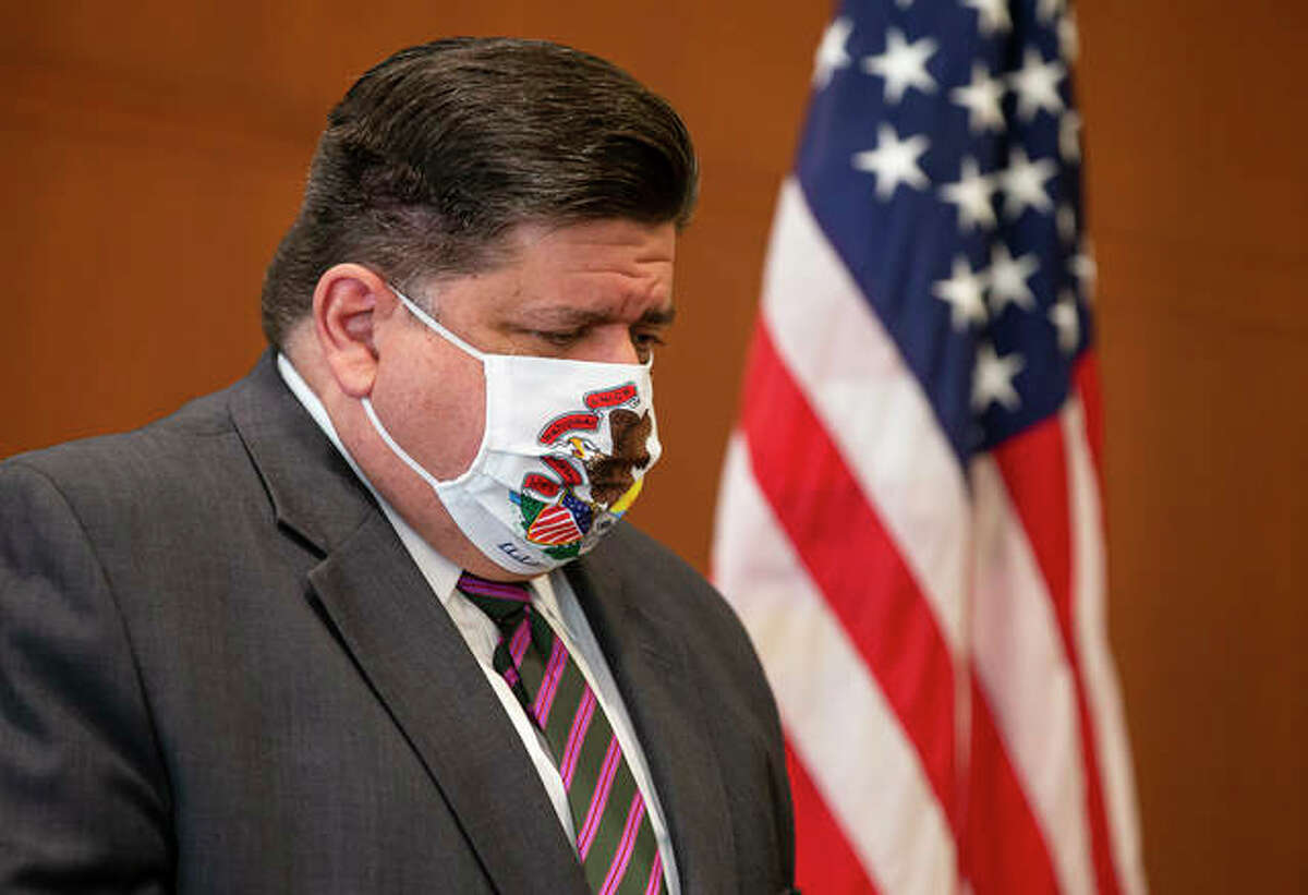 In this Sept. 21, 2020 file photo, Gov. J.B. Pritzker appears at a news conference wearing a mask.