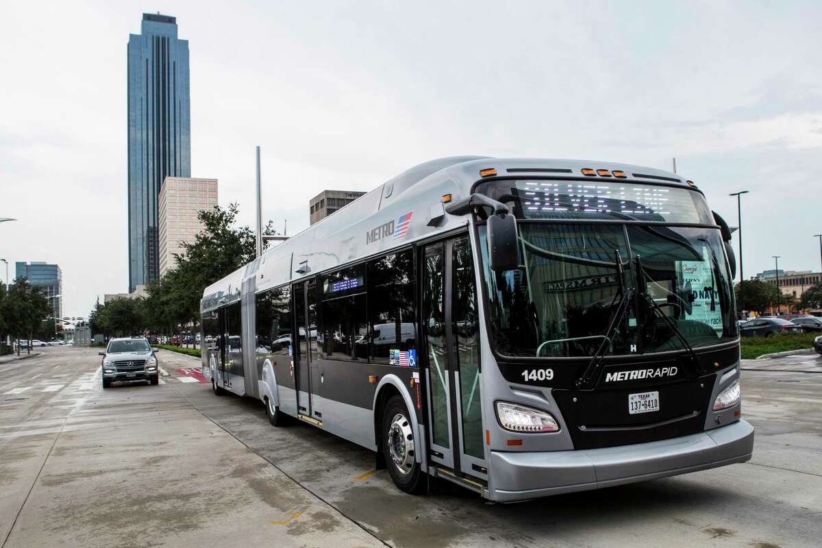 A Metropolitan Transit Authority Silver Line bus rolls along Post Oak in the Galleria on Aug. 26, 2021 in Houston. Metro is committing to buying zero-emission buses by 2030, but mostly runs diesel buses, including the new 60-foot buses that operate the Silver Line through Uptown.