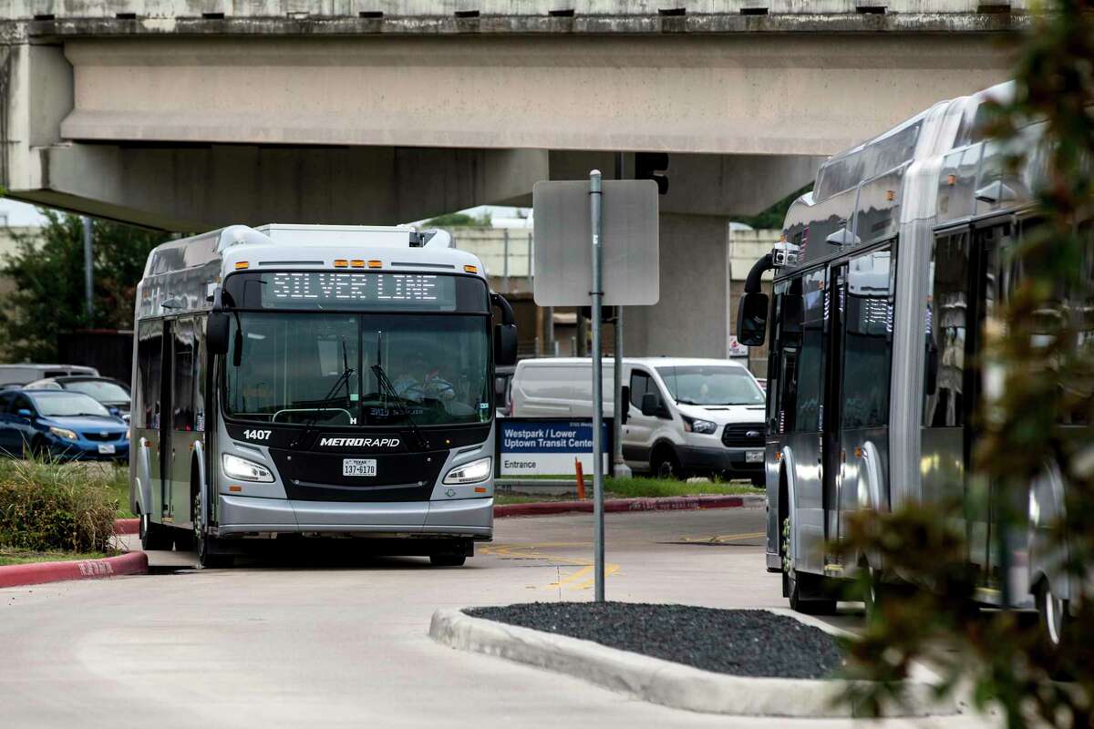 A Metropolitan Transit Authority Silver Line bus turns into the Westpark/Lower Uptown Transit Center near the Galleria on Aug. 26, 2021 in Houston. Metro is committing to buying zero-emission buses by 2030, but mostly runs diesel buses, including the new 60-foot buses that operate the Silver Line through Uptown.
