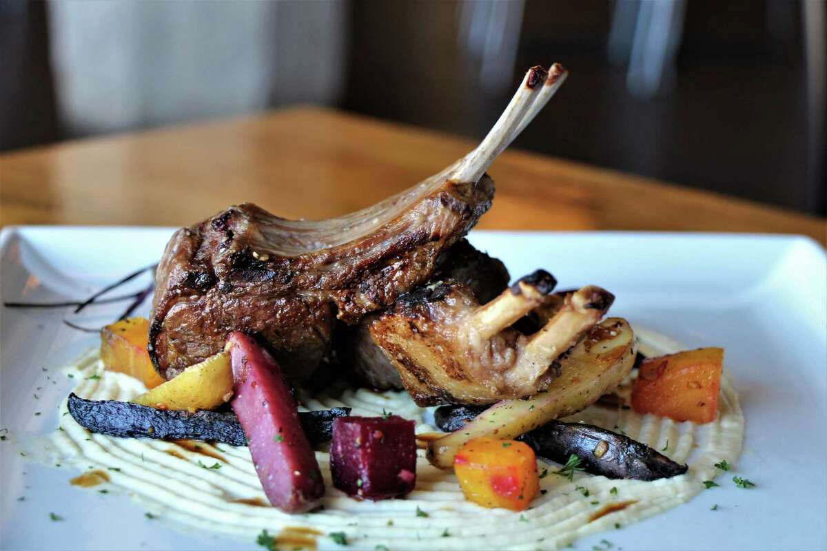 Grilled lamb chops with celery root puree and roasted root vegetables at the West Table restaurant in Lubbock, Texas.