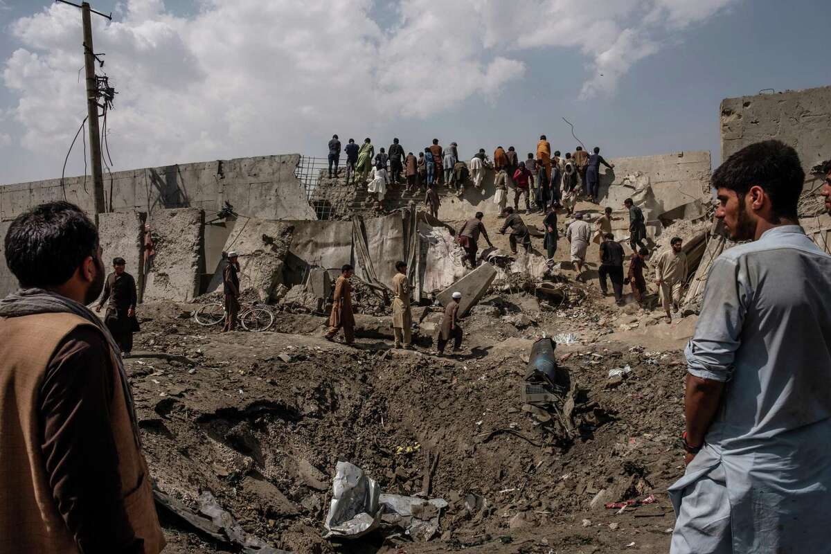 FILE — A crater left by a car bomb attack, for which the Taliban claimed responsibility, in Kabul, Afghanistan, Sept. 3, 2019. The U.S. invaded Afghanistan 20 years ago in response to terrorism, and many worry that Al Qaida and other radical Islamist groups will again find safe haven there. (Jim Huylebroek/The New York Times)