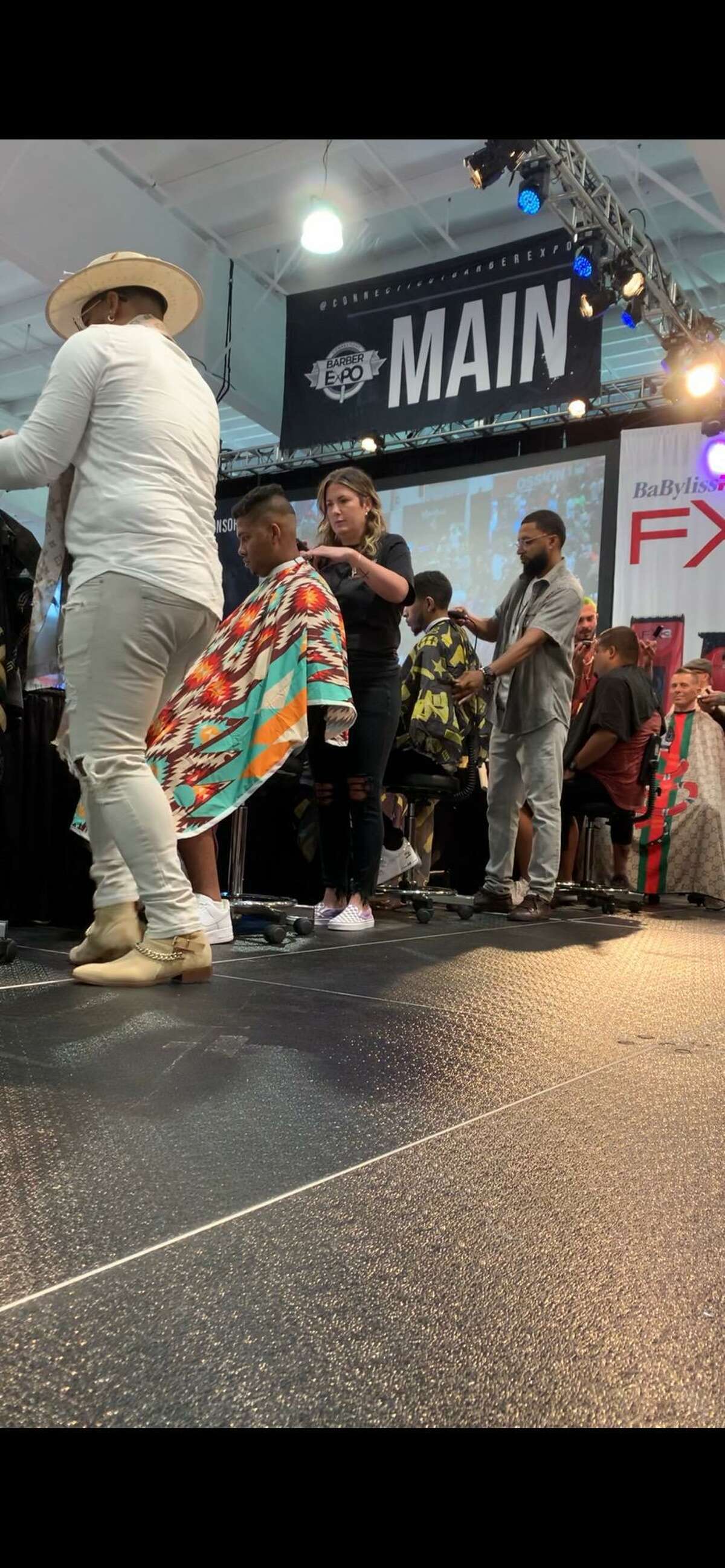Groom barbers Amy Pozzo and Brock Sanford participated in the 10th annual CT Barber Expo at Mohegan Sun Aug. 16-17. Each competed in a different category, Pozzo, pictured, was the only woman in the “15 minute fade” contest.