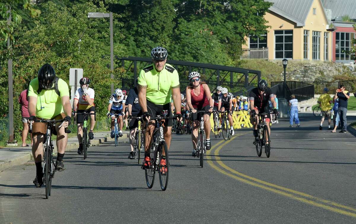 Riders begin the Folks on Spokes and Step Forward Memorial Walk in Milford on September 16, 2018. The ride and walk raised funds for Bridges Healthcare to support mental health and addiction recovery.