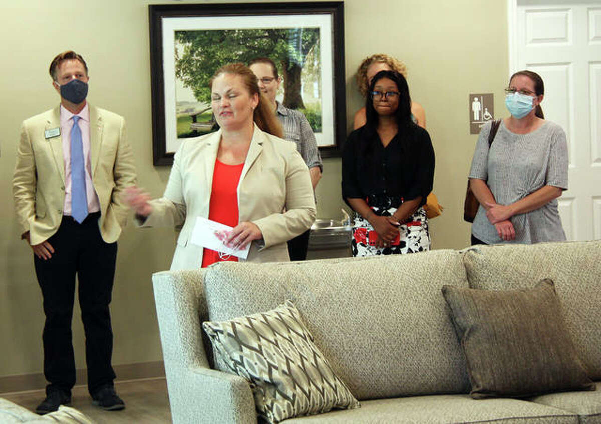 Sen. Rachelle Crowe speaks to a gathering Friday in the new clubhouse at the Edwardsville Senior Living facility prior to a ribbon-cutting.
