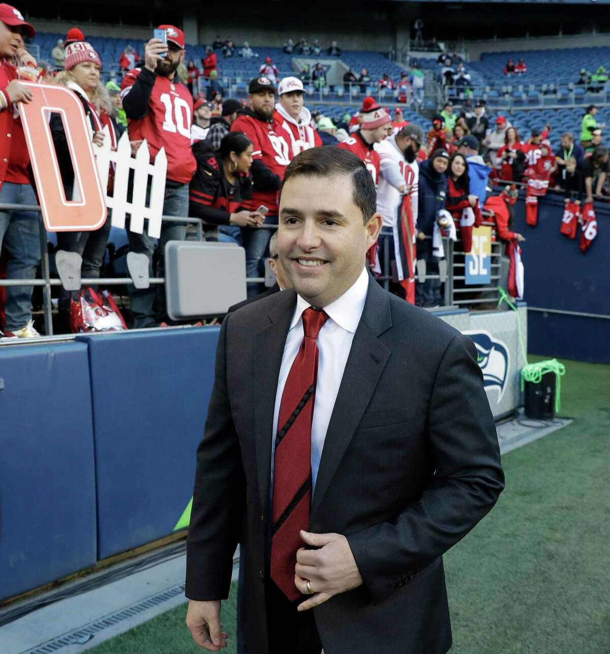 San Francisco 49ers team owner Jed York walks on the field before an NFL football game against the Seattle Seahawks, Sunday, Dec. 29, 2019, in Seattle. (AP Photo/Ted S. Warren)