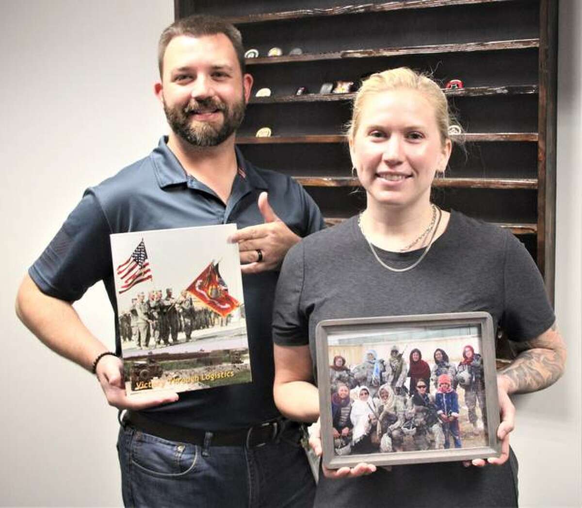 Bradley Yount, left, and Torie Ryan are veterans service officer benefit specialists with the Madison County Veterans Assistance Commission. Yount was a Marine satellite communications specialist and Ryan served as a medic with the 101st Airborne. Both are veterans of Afghanistan and talked about their experiences and feelings as the U.S. pulled out of the country last week.