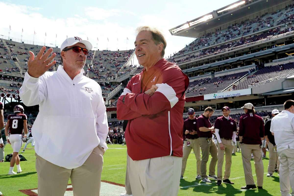 Alabama's Nick Saban (right) said Texas A&M, led by Jimbo Fisher, a former assistant of his, “bought every player” in its top-ranked recruiting class.