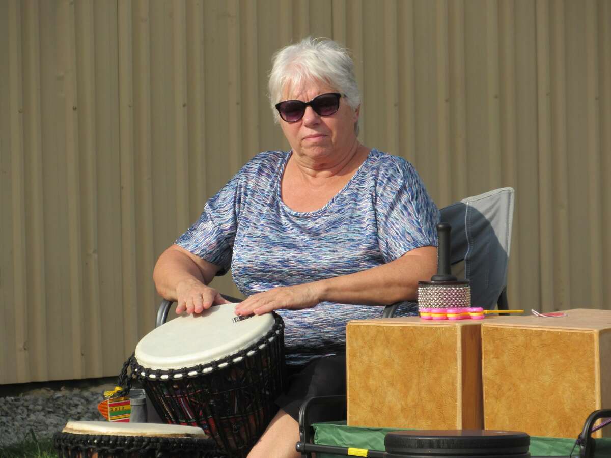 Musicians and music lovers alike participate in workshops and browse vendors' stalls at the annual Folk Music Festival on Saturday, Aug. 28, 2021 at the Midland County Fairgrounds.