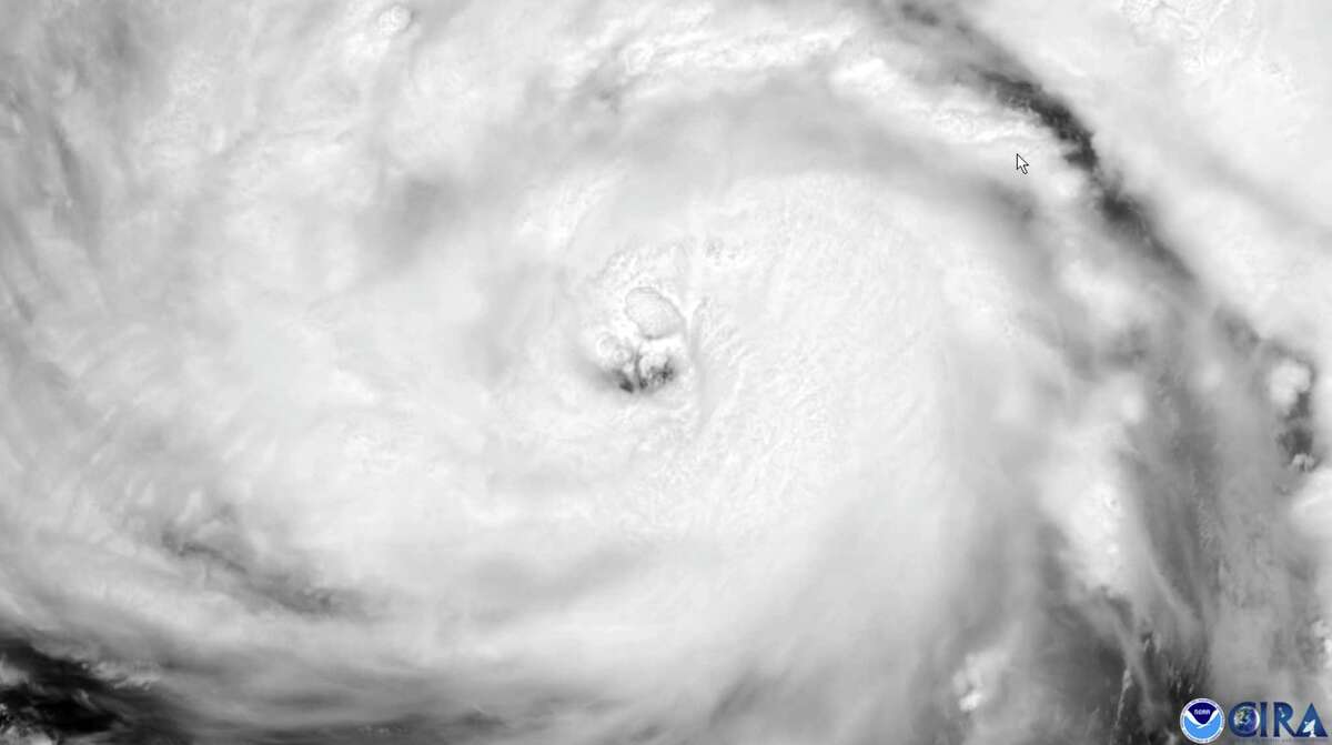 This satellite image provided by NOAA shows a close-up view of Hurricane Ida, Saturday, August 28, 2021. Forecasters warned residents along the northern Gulf of Mexico coast to rush preparations Saturday ahead of an intensifying Hurricane Ida, which is expected to bring winds as high as 130 mph (209 kph), life-threatening storm surge and flooding rain when it slams ashore in Louisiana on Sunday. (NOAA via AP)