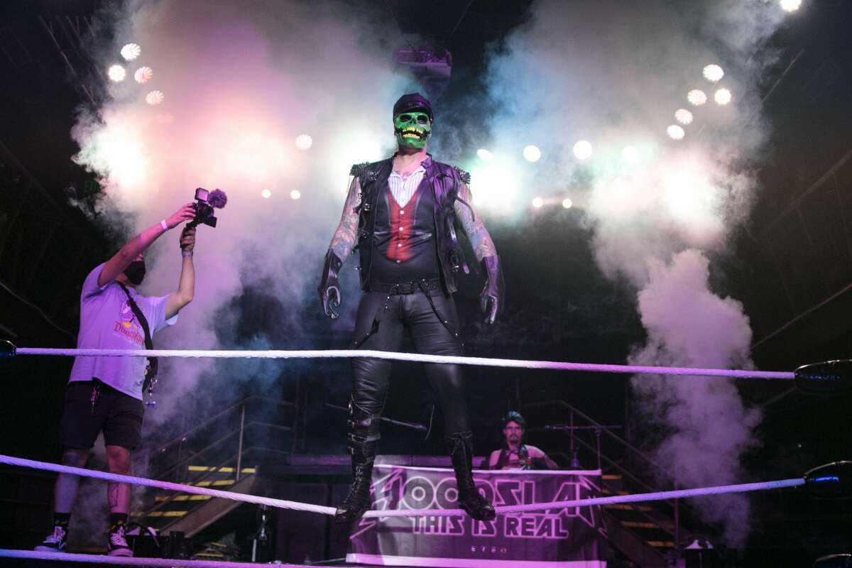 Commentator Doc Atrocity is introduced at the start of the Hoodslam, an underground pro wrestling show at DNA Lounge in San Francisco on Aug. 22, 2021.