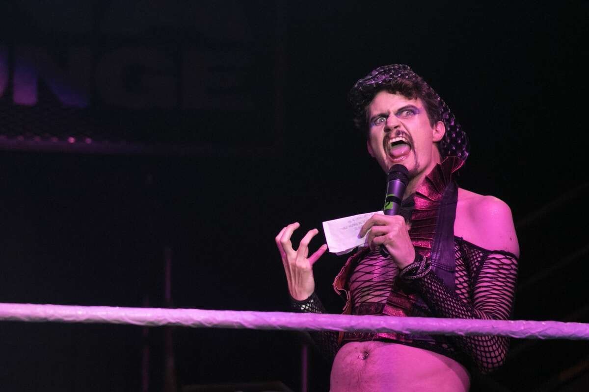 Announcer Wonder Dave is introduced at the start of the Hoodslam underground pro wrestling show at the DNA Lounge in San Francisco on Aug. 22, 2021.