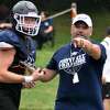 Wethersfield coach Matt McKinnon coaches up a player during a football scrimmage against Xavier at Wethersfield High, Wethersfield on Saturday, Aug. 28, 2021. (Pete Paguaga, Hearst Connecticut Media)