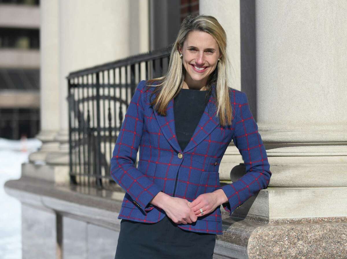 State. Rep. Caroline Simmons, D-Stamford, poses in downtown Stamford, Conn. Wednesday, Feb. 10, 2021. Simmons, a representative of the state's 144th District for the last six years, is one of two candidates running for mayor against incumbent David Martin.