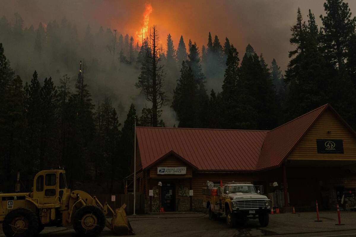 Crews perform back burn operations behind the Strawberry store in Strawberry, Calif. to help contain the Caldor Fire. Cal Fire and weather forecasters said the risk of new, potentially catastrophic wildfires starting would heighten in July for Northern California.