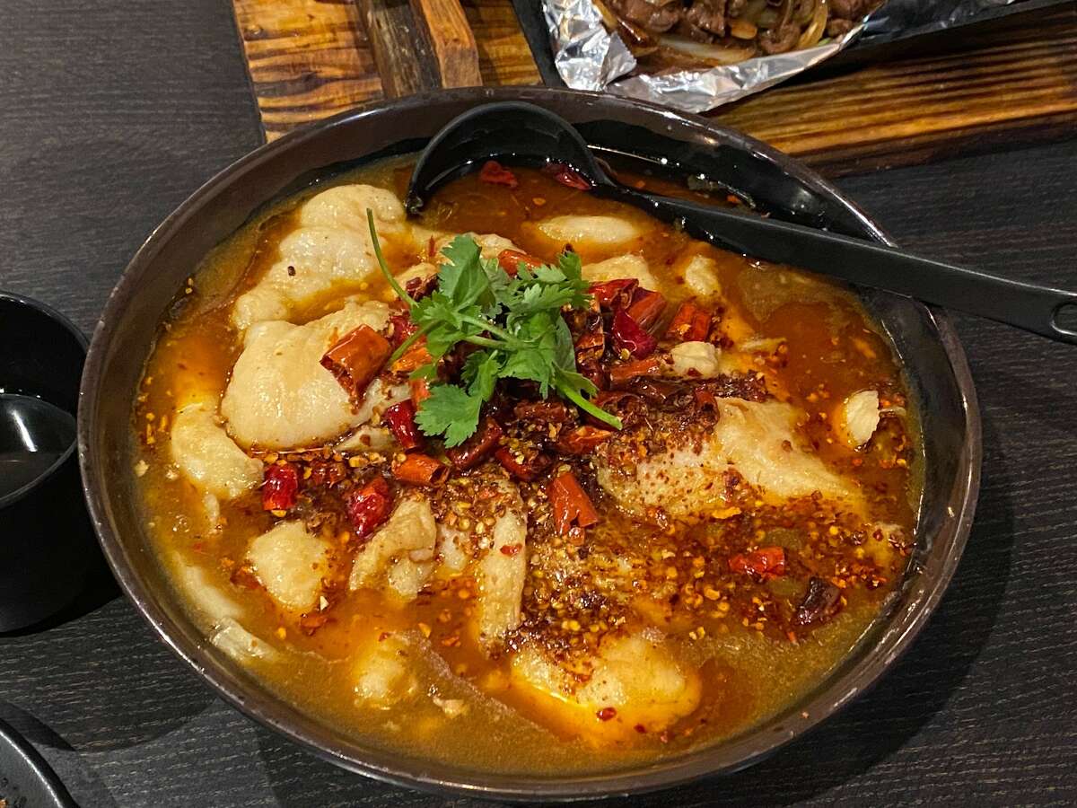 Fish in flaming chili oil at Spices Restaurant on Aug. 28, 2021.