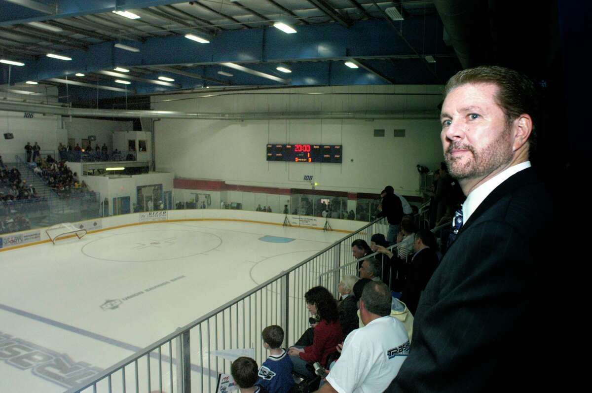 In this file photo, James Galante watches from his private box on the opening night of the Trasher's first season in Danbury.(2004) The Danbury Trashers are the subject of a new documentary, “Untold: Crime and Penalties,” on Netflix.