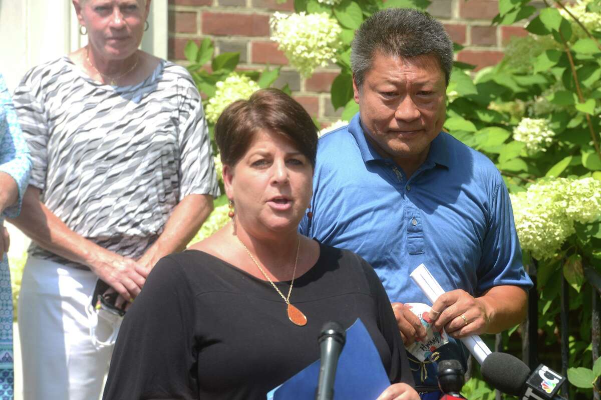 Dawn Parker, Director of UniteCT for the Connecticut Department of Health, speaks during a news conference in front of Operation Hope, in Fairfield, Conn. Aug. 30, 2021.