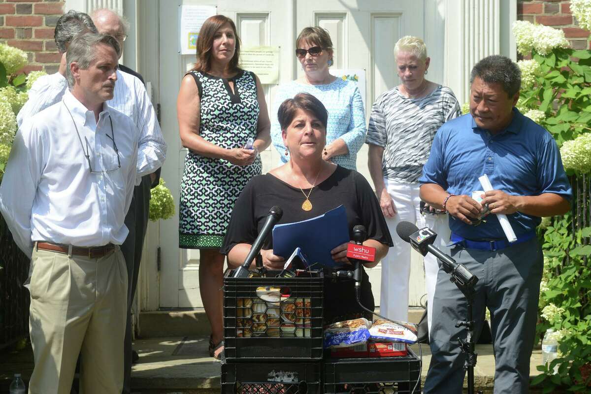 Dawn Parker, director of UniteCT for the state Department of Health, speaks during a news conference in front of Operation Hope in Fairfield on Aug. 30.