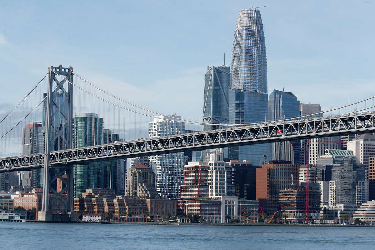 The Bay Bridge and the San Francisco skyline including the Salesforce Tower are seen in this view from the bay.