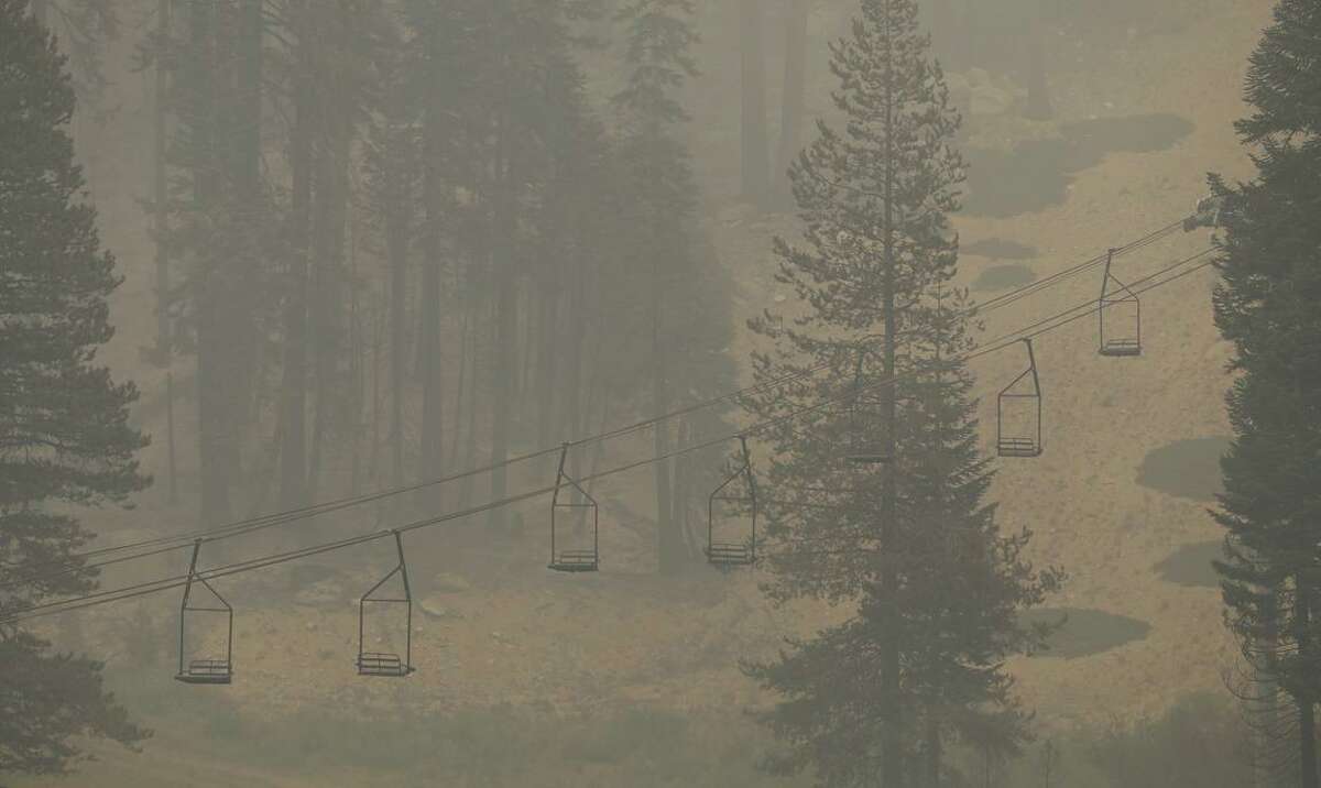 Heavy smoke from the Caldor Fire can be seen at Sierra-at-Tahoe ski resort in Twin Bridges on Monday.