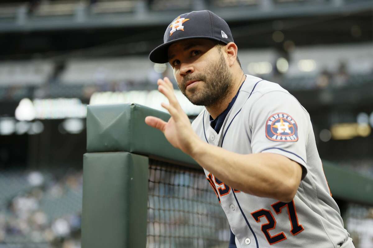 Seattle Mariners' Luis Torrens reacts after he slid safely home to score on  a RBI single hit by Ty France during the sixth inning of a baseball game  against the Houston Astros