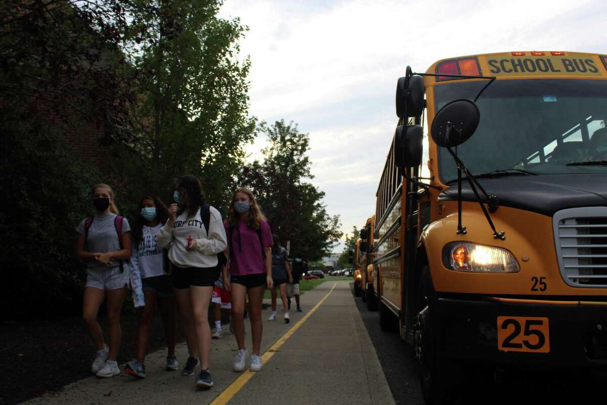 Scotts Ridge Middle School students arrive masked to the first day of classes for the 2021-22 school year.