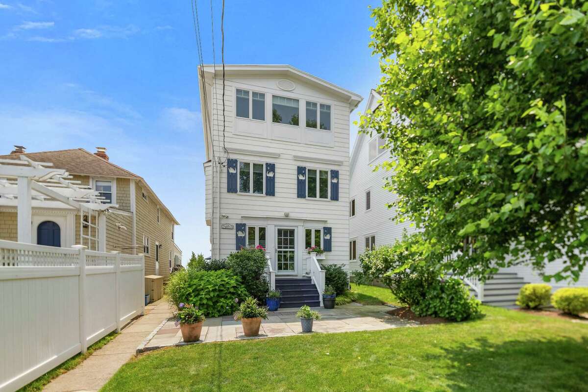 On the Market Expanded Fairfield cottage right on the beach