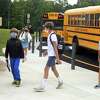 Students arrive for the first day of classes at Coleytown Middle School, in Westport, Conn. Aug. 31, 2021.