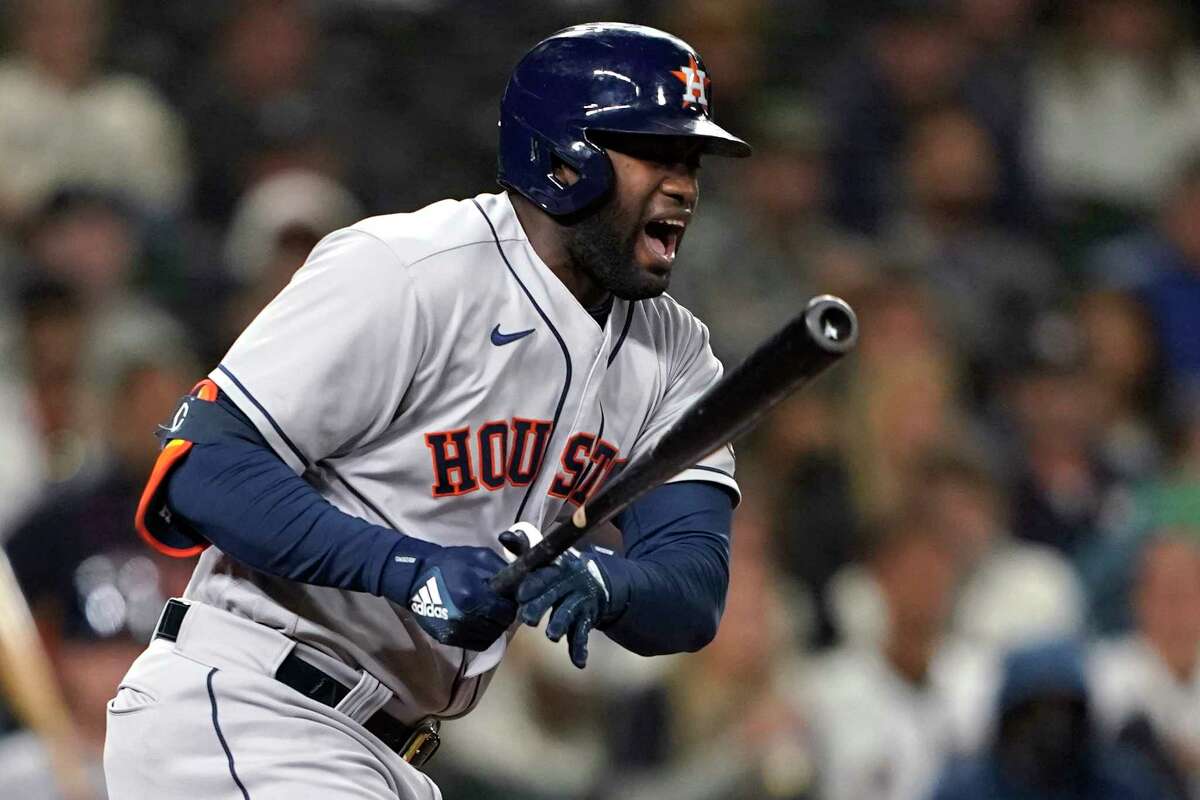 Houston Astros' Yordan Alvarez reacts to a foul ball during the sixth inning of the team's baseball game against the Seattle Mariners, Tuesday, Aug. 31, 2021, in Seattle. Alvarez flew out on the at-bat. (AP Photo/Ted S. Warren)
