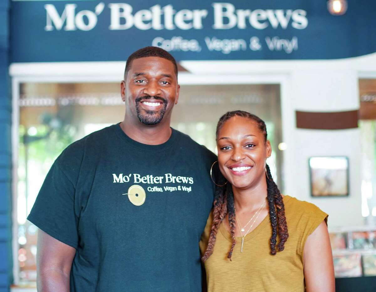 Chasitie and Courtney Lindsay in their Mo'Better Brews restaurant in Houston on Thursday, July 22, 2021. The couple have been creating a vegan empire in a relatively short amount of time in addition to Mo'Better Blues the couple owns Houston Sauce Co, Shopette and Green Zone.