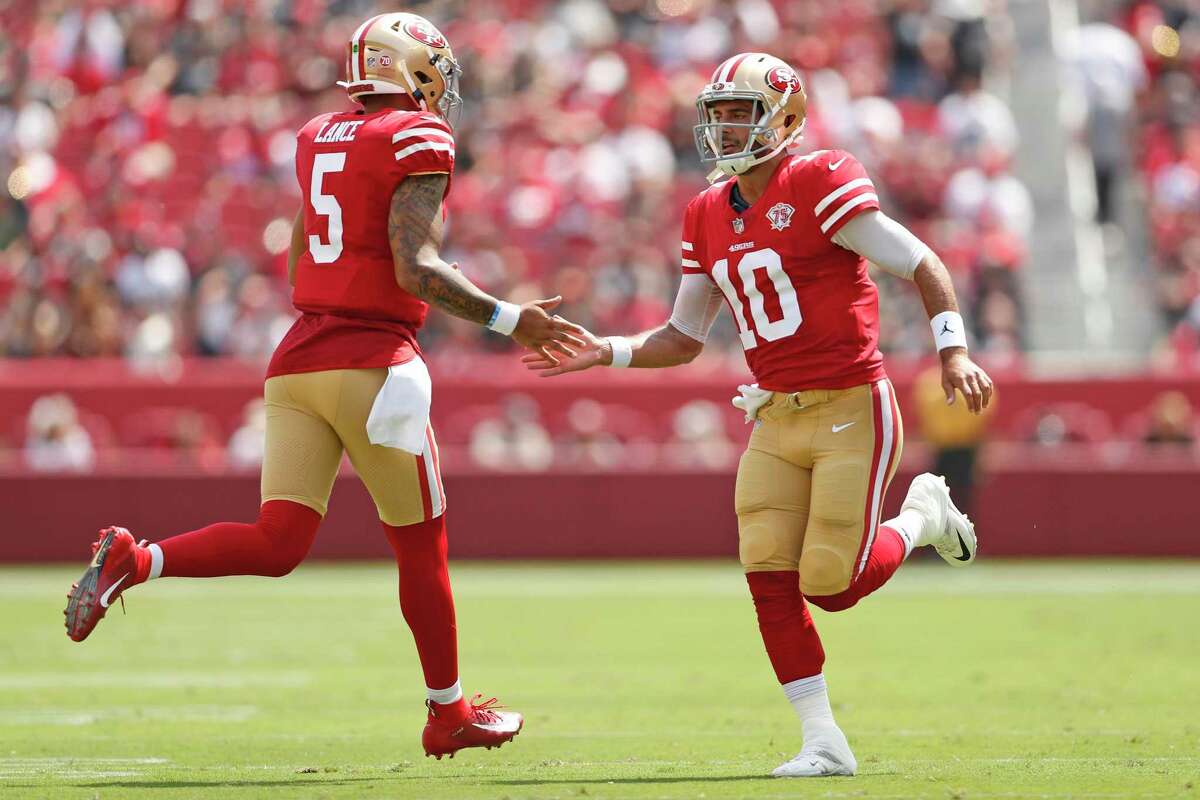 San Francisco 49ers' quarterbacks Jimmy Garoppolo and Trey Lance switch in and out in 2nd quarter against Las Vegas Raiders during NFL preseason game at Levi's Stadium in Santa Clara, Calif., on Sunday, August 29, 2021.