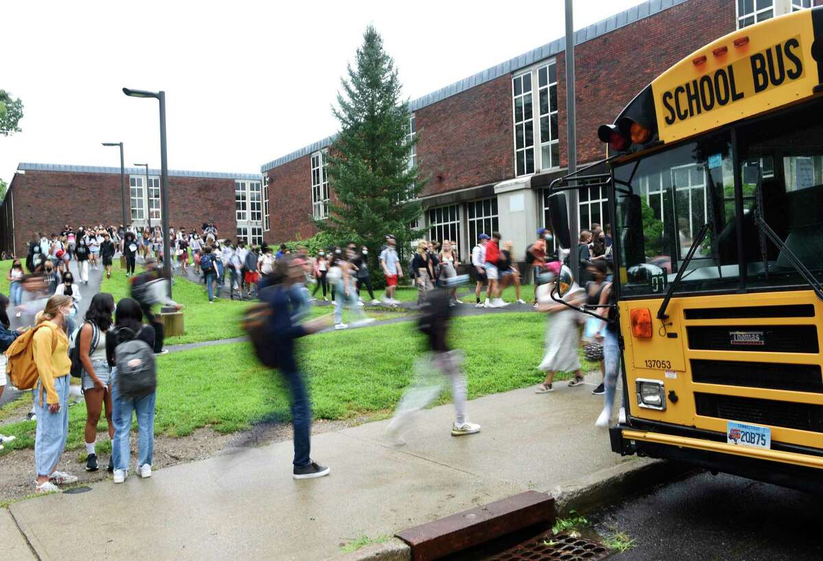 Students are dismissed after the first day of the 2021-2022 school year at Greenwich High School in Greenwich, Conn. Wednesday, Sept. 1, 2021 The overall enrollment numbers are down in the Greenwich Public Schools, and school board members are looking for more information.