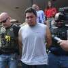 Joaquin Garcia is transported from the Beaumont Police Headquarters to jail after being interviewed by policeinn regards to the stabbing death of Norlan Moreno. Garcia was arrested in Victoria, Texas, Tuesday night. Photo made Thusday, April 22, 2021 Kim Brent/The Enterprise
