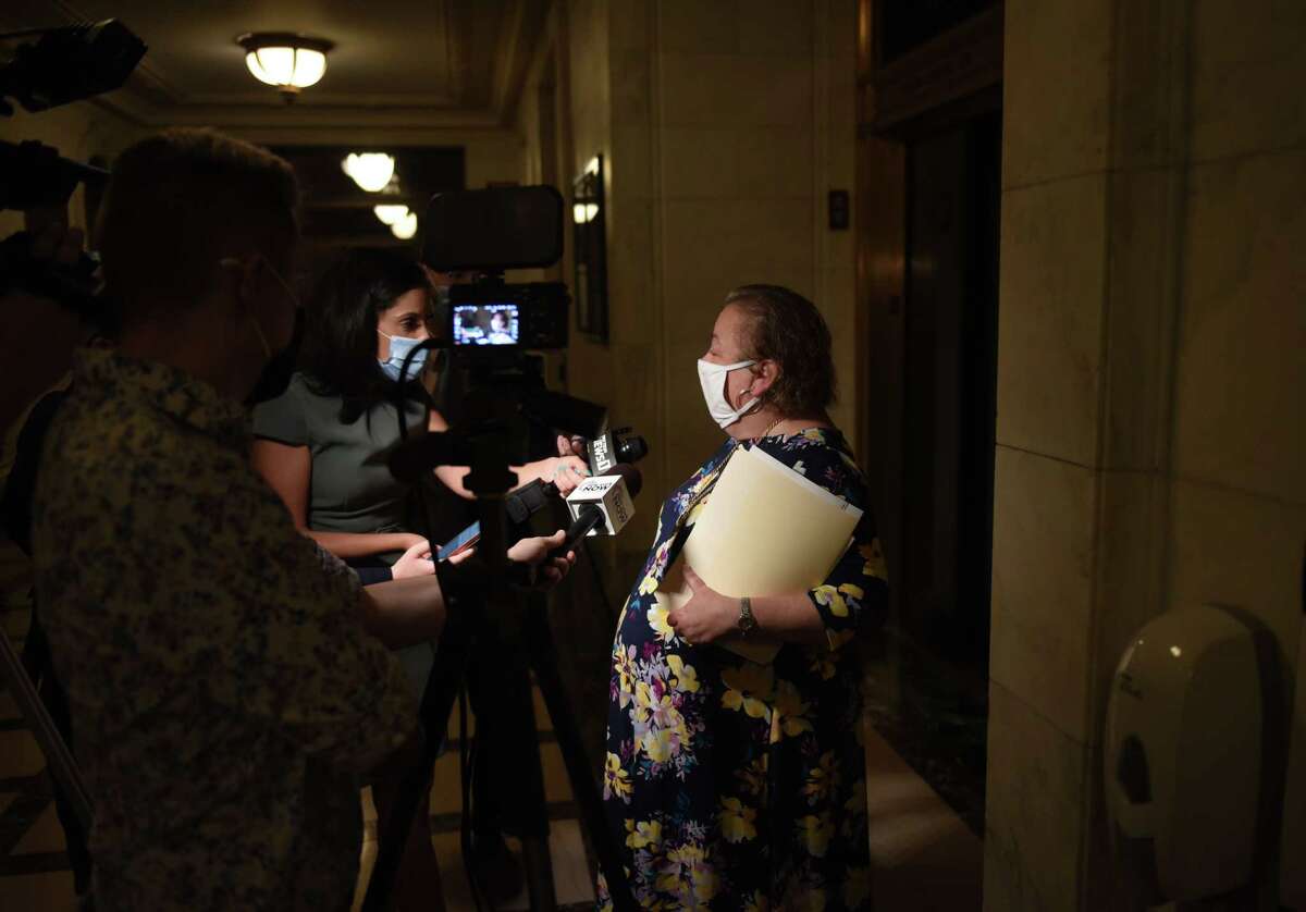 State Sen. Liz Krueger talks to reporters after meeting with Senate Majority Leader Andrea Alice Stewart-Cousins before the start of a special session on Wednesday Sept. 1, 2021, at the Capitol in Albany, N.Y.