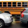 A school bus enters Roton Middle School as traffic backs up on Highland Avenue in Norwalk, Conn., on Wednesday September 1, 2021. Traffic on Highland Avenue stretches from Roton Middle School north to Brien McMahon High School and Brookside Elementary School.