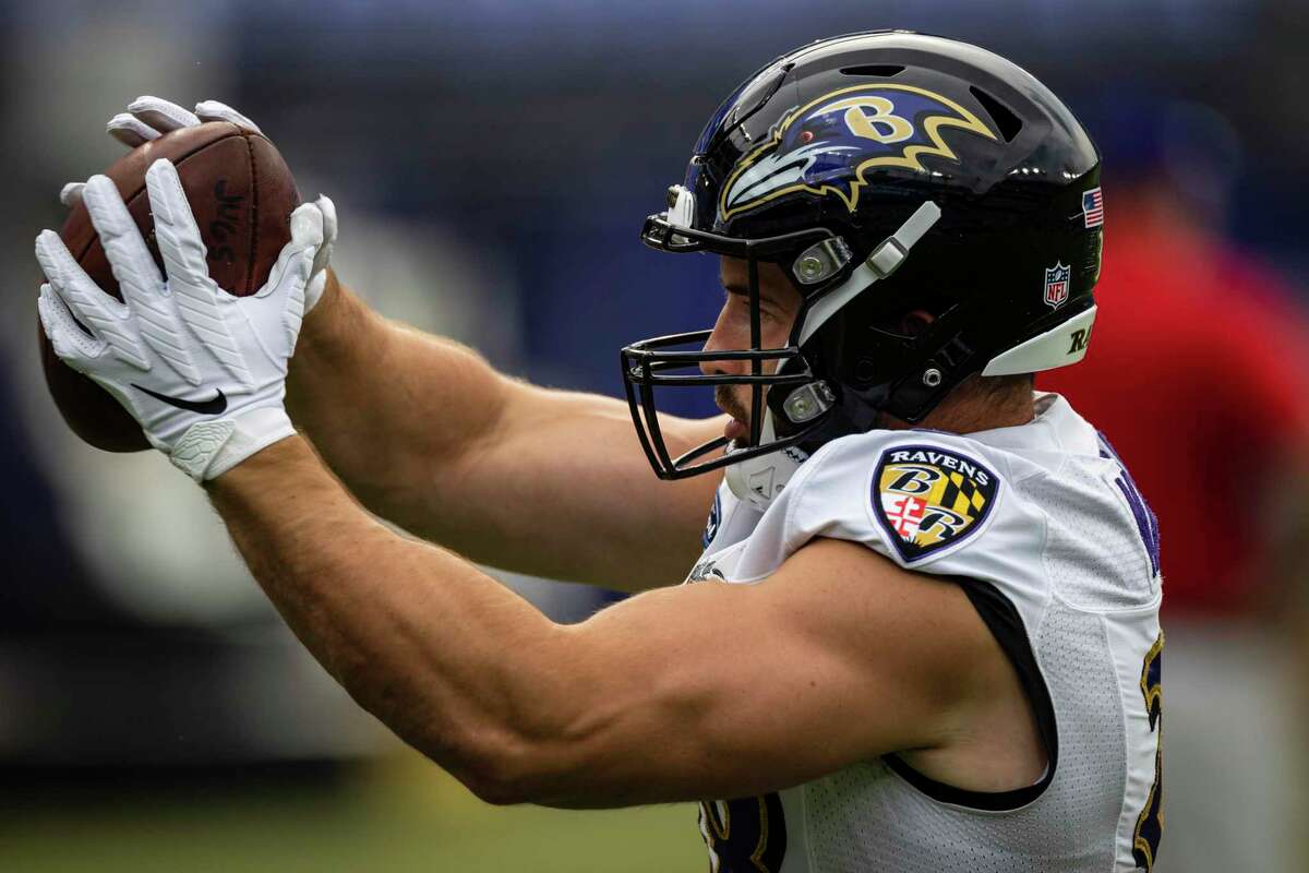 Ravens fullback Ben Mason catches a pass during practice on July 31 in Baltimore. The former Newtown High star was released earlier this week and is expected to sign with the Patriots.