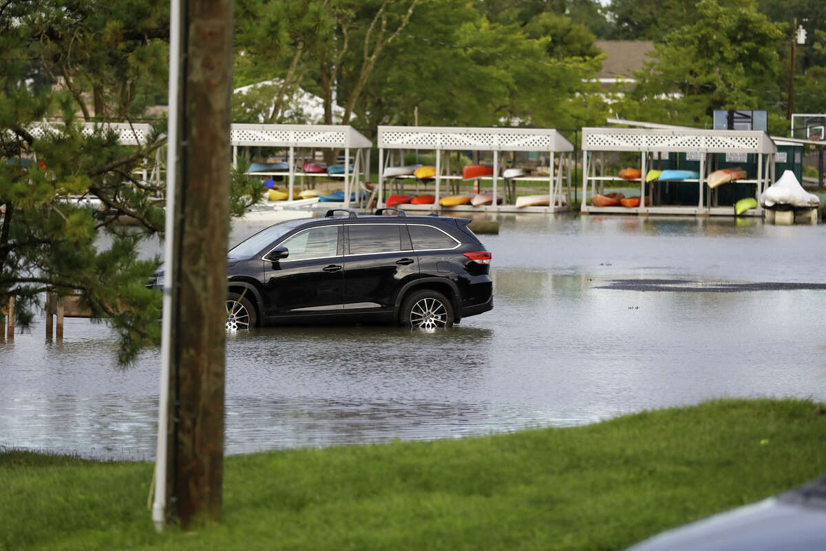 A flooded parking lot at Roton Point Club after remnants of Ida hit Connecticut overnight on Thursday, Sept. 2, 2021.