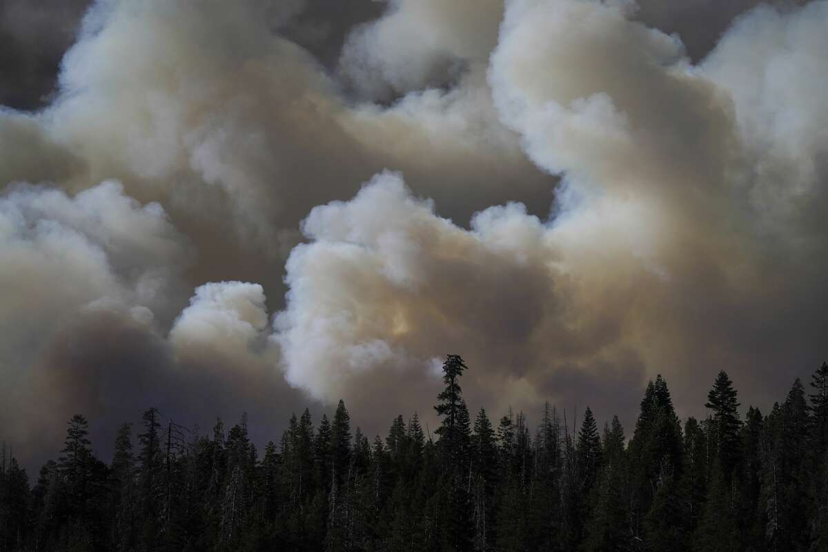 Huge plumes of smoke generated by the Caldor Fire are seen from Kirkwood, Calif., Wednesday, Sept. 1, 2021.