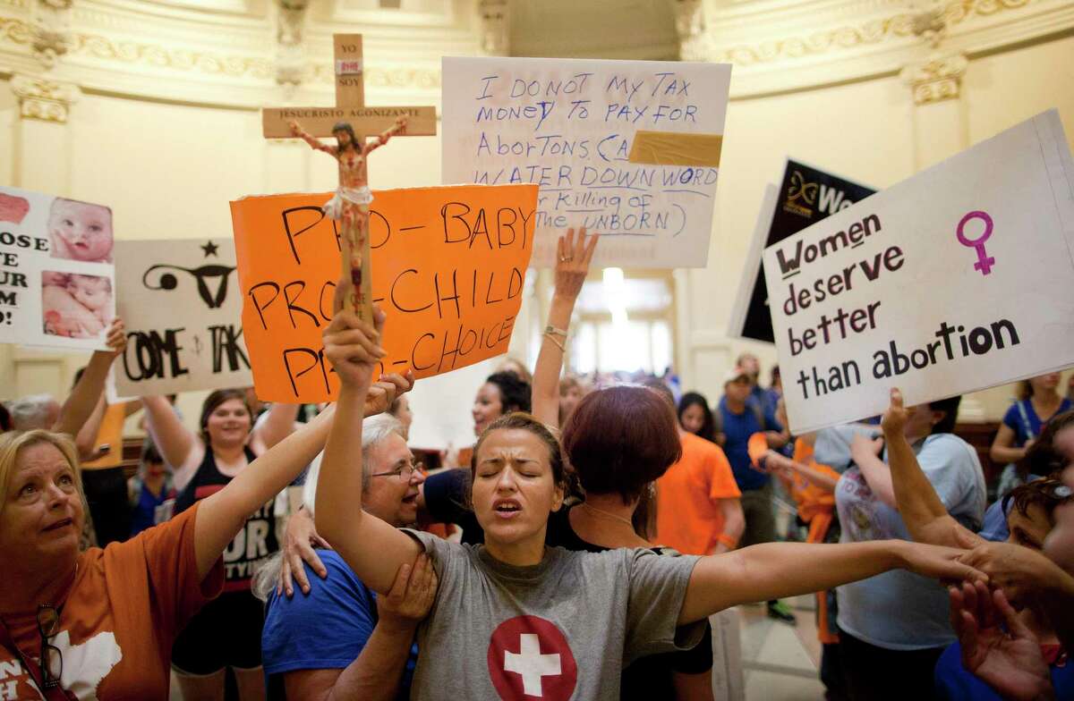 Antiabortion activists protest in the state Capitol rotunda in Austin, Texas, in 2013.