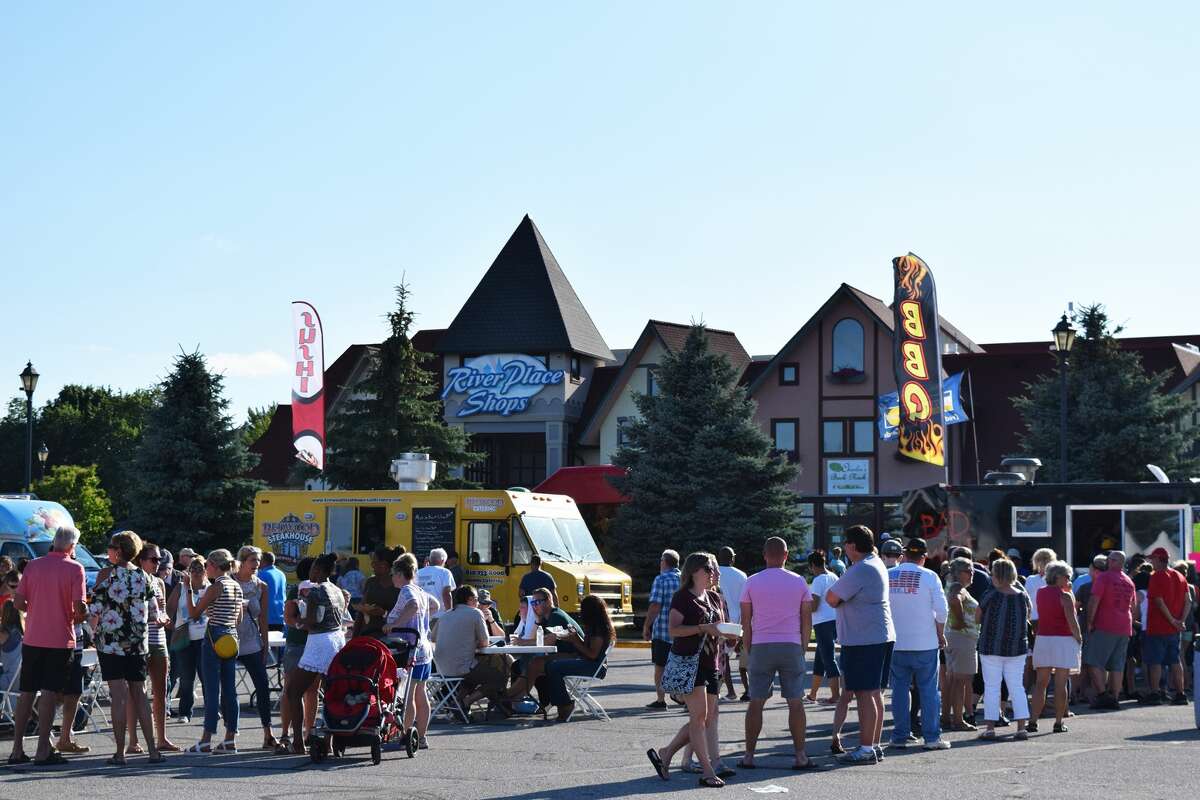 People gather at Frankenmuth River Place Shops for the Funtown Chowdown Food Truck Festival.