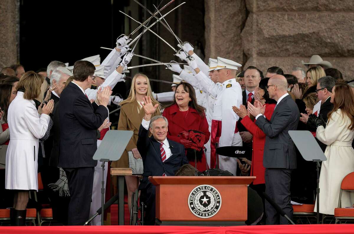 Gov. Greg Abbott arrives with his wife Cecilia and daughter Audrey at the oath of office ceremony on Inauguration Day at the Capitol on Tuesday Jan. 15, 2019. (Jay Janner/Austin American-Statesman/TNS)