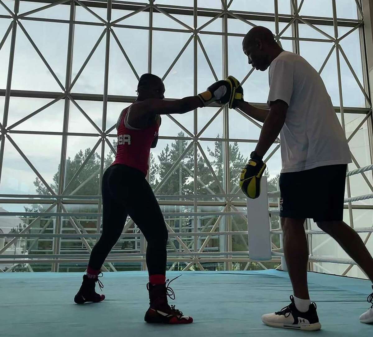 Oshae Jones trains with San Antonio boxing coach Jeff Mays at a training camp in Miyazaki, Japan. Jones won the bronze medal at the 2020 Tokyo Olympics in the women’s 152-pound division.