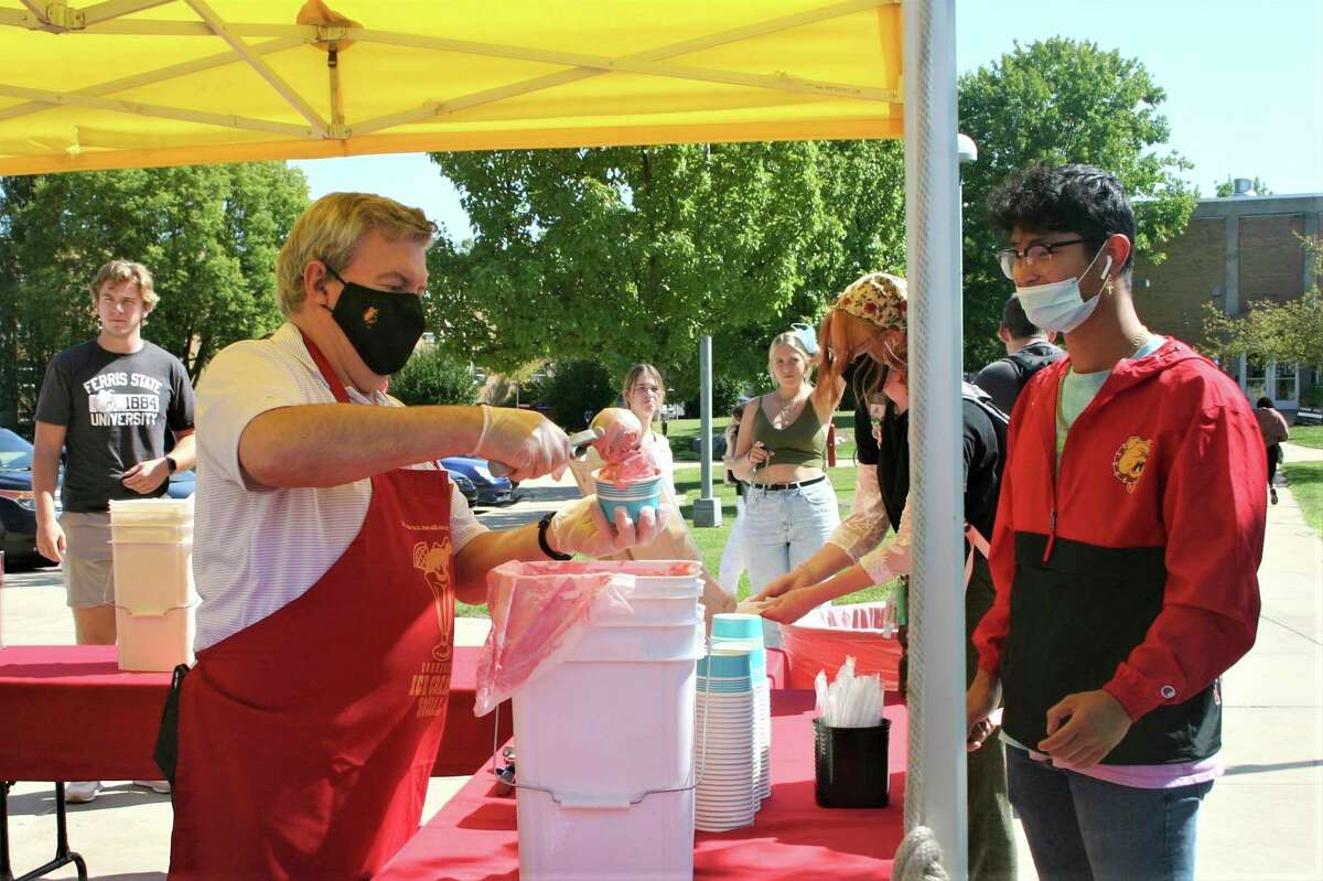 Ferris State University students and staff gathered in Robinson Quad for a resource fair and ice cream social Thursday afternoon. The event was part of the university's annual Founder's Day celebration. (Pioneer photo/Cathie Crew)