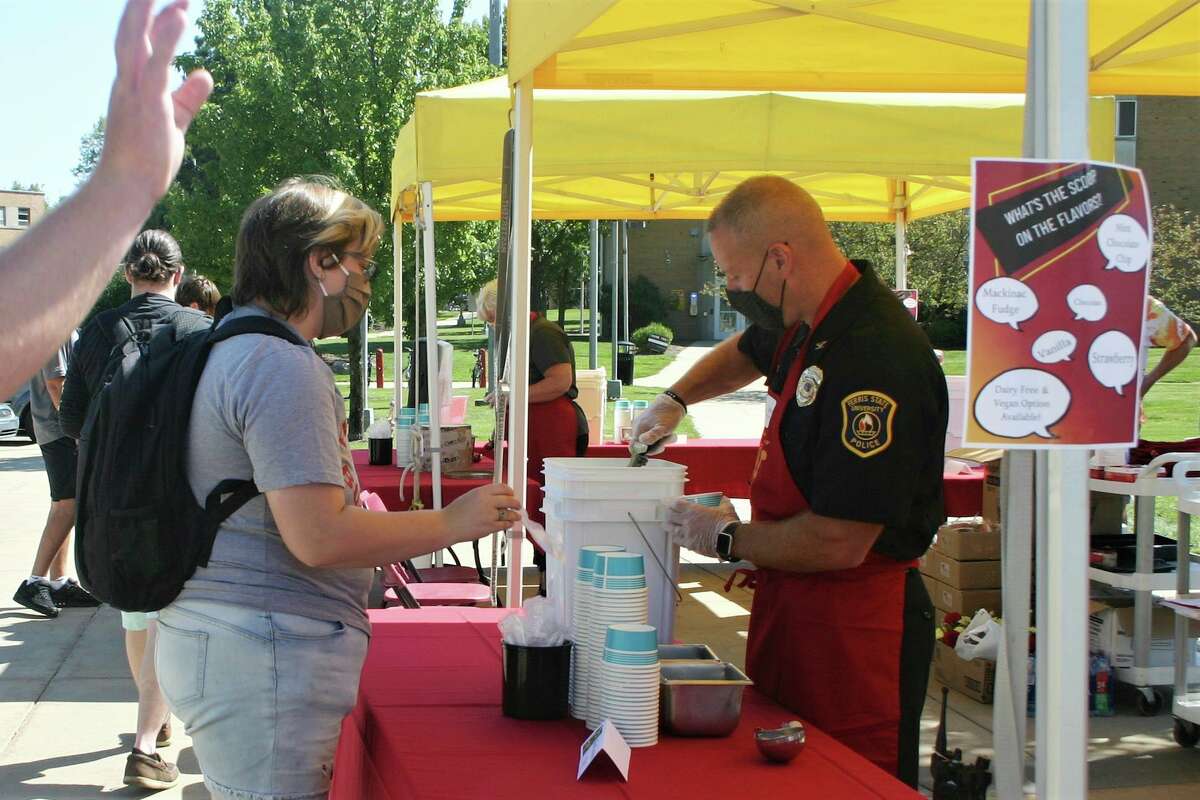 Ferris State University students and staff gathered in Robinson Quad for a resource fair and ice cream social Thursday afternoon. The event was part of the university's annual Founder's Day celebration. (Pioneer photo/Cathie Crew)