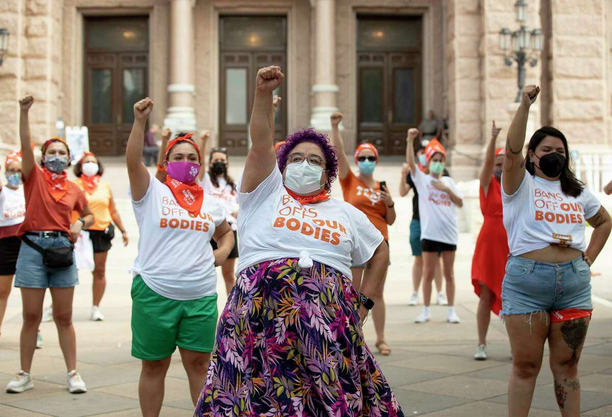Barbie H. leads a protest against the six-week abortion ban at the Capitol in Austin, Texas, on Wednesday, Sept. 1, 2021. Dozens of people protested the abortion restriction law that went into effect Wednesday. (Jay Janner/Austin American-Statesman via AP)