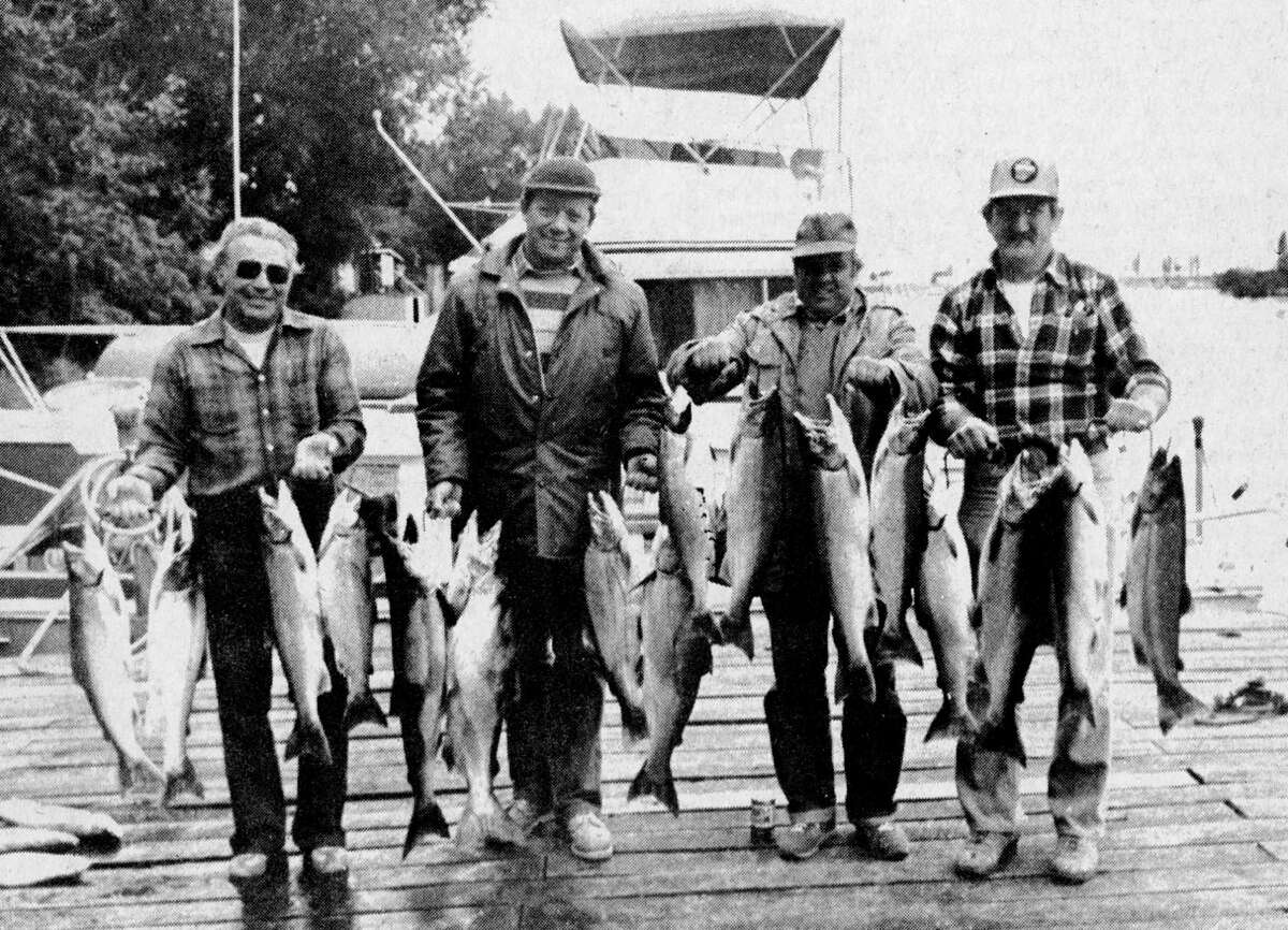 (From left) A fishing crew made up of Ralph Elsigan, of Canada; Rudy Graf, of Munich, Germany; Werner Kienzol, also of Munich; and Bob Kuisibab, of Wellston had a good outing this week on Lake Michigan. The party reported getting over 50 strikes and hauled in 19 salmon, including three kings and 16 coho salmon. The photo was published in the News Advocate on Sept. 4, 1981. (Manistee County Historical Museum photo)