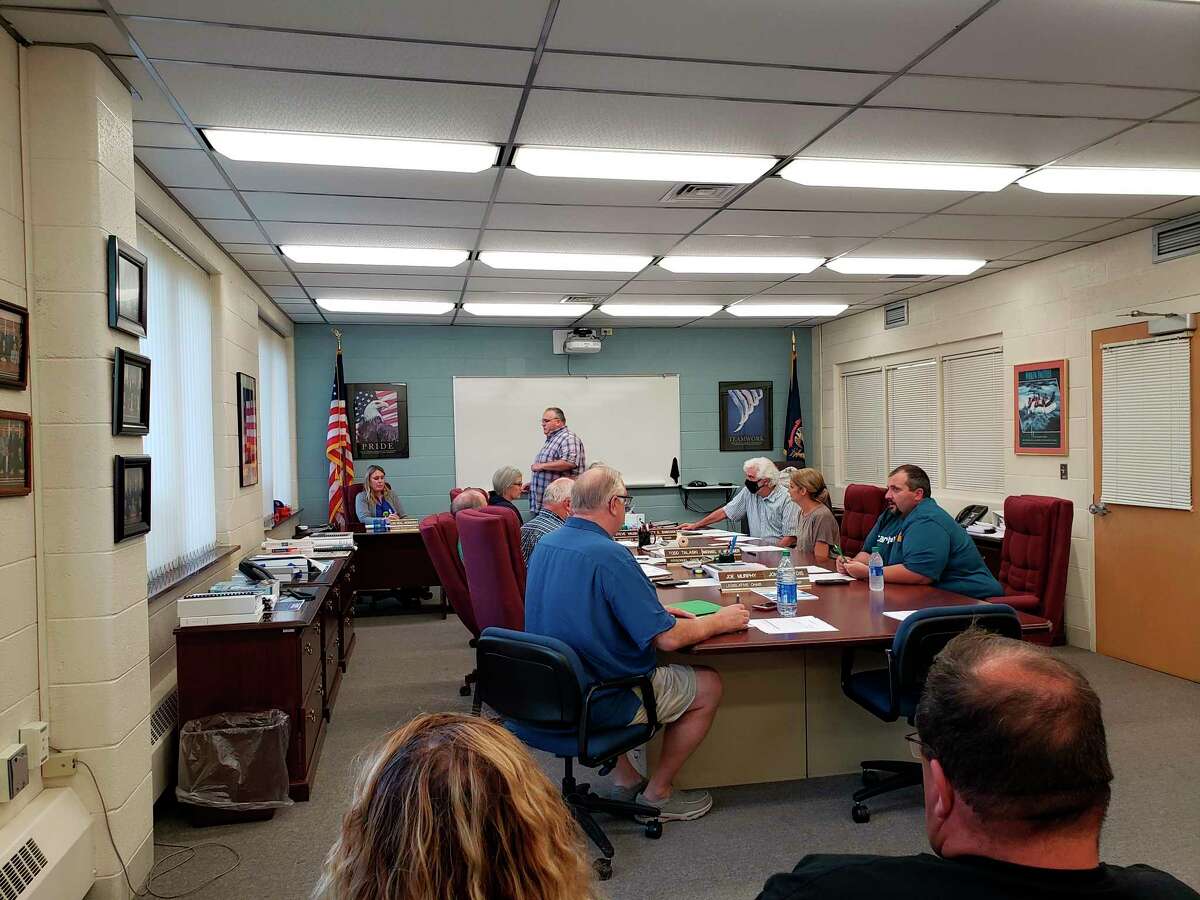 The Huron County planning commission before their meeting this week, where Harbor Beach resident Dennis O'Neil talked about a dispute involving a neighbor's signs in Rubicon Township. The dispute has been going on since last October, with the county taking action to have the signs taken down. (Robert Creenan/Huron Daily Tribune)
