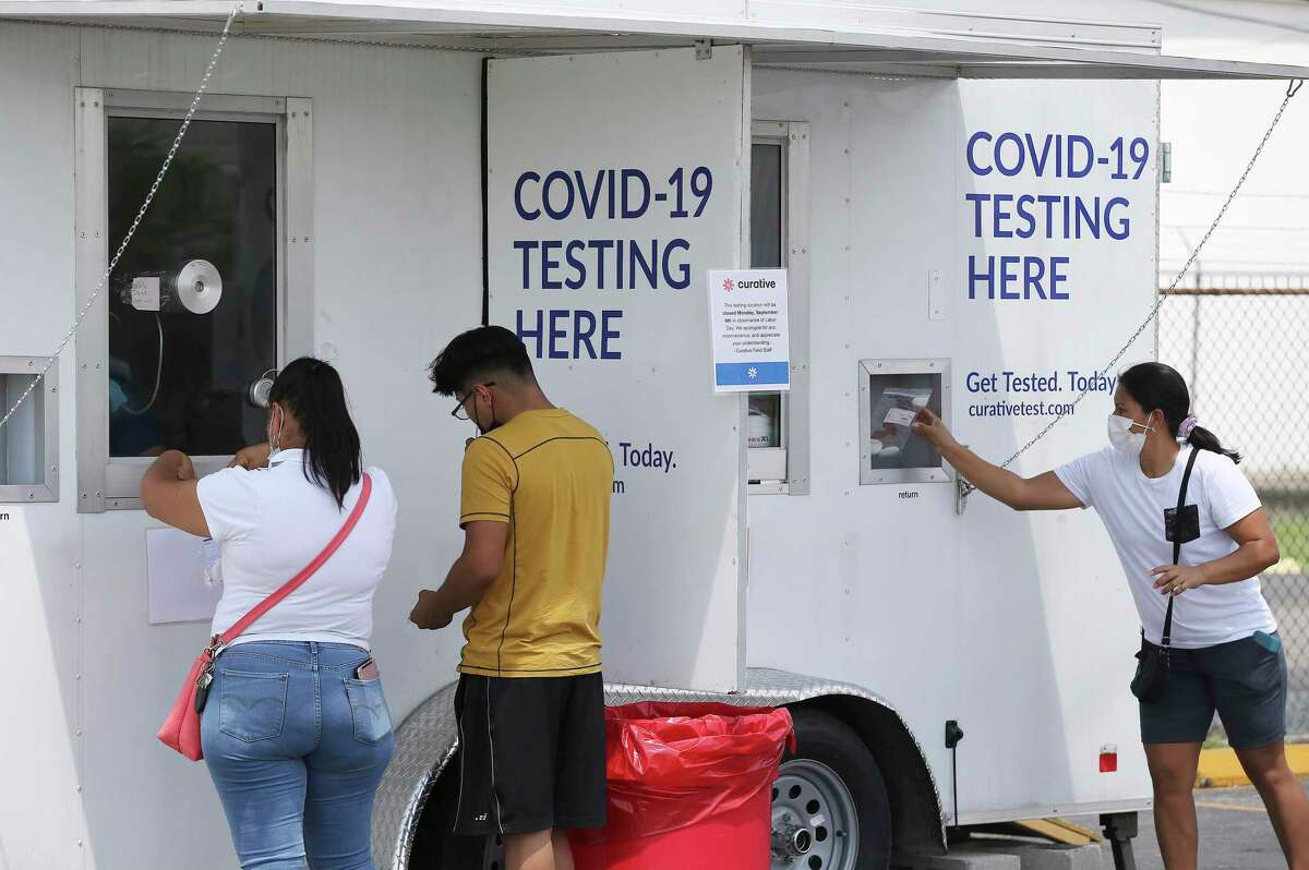 People go get tested for COVID-19 at the mobile testing site at the American Legion Alamo Post #2 on Fredericksburg Road on Friday, Sept. 3.