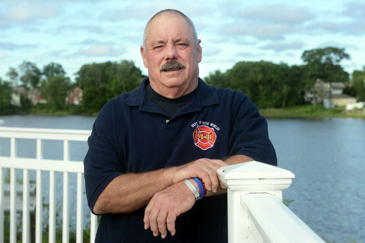 Lt. Dave Russell, a member of the FDNY and Fairfield native, poses near his home in Bridgeport.