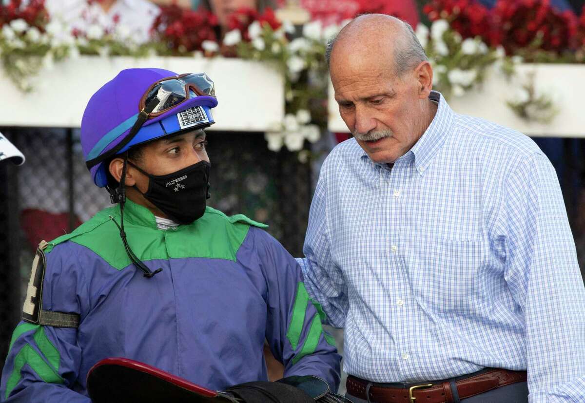 Jockey Manuel Franco speaks to trainer Bob Ribaudo after winning the 9th running of The Luck Coin on Pulsate at the Saratoga Race Course Thursday Sep, 2 2021 in Saratoga Springs, N.Y. Special to the Times Union Photo by Skip Dickstein